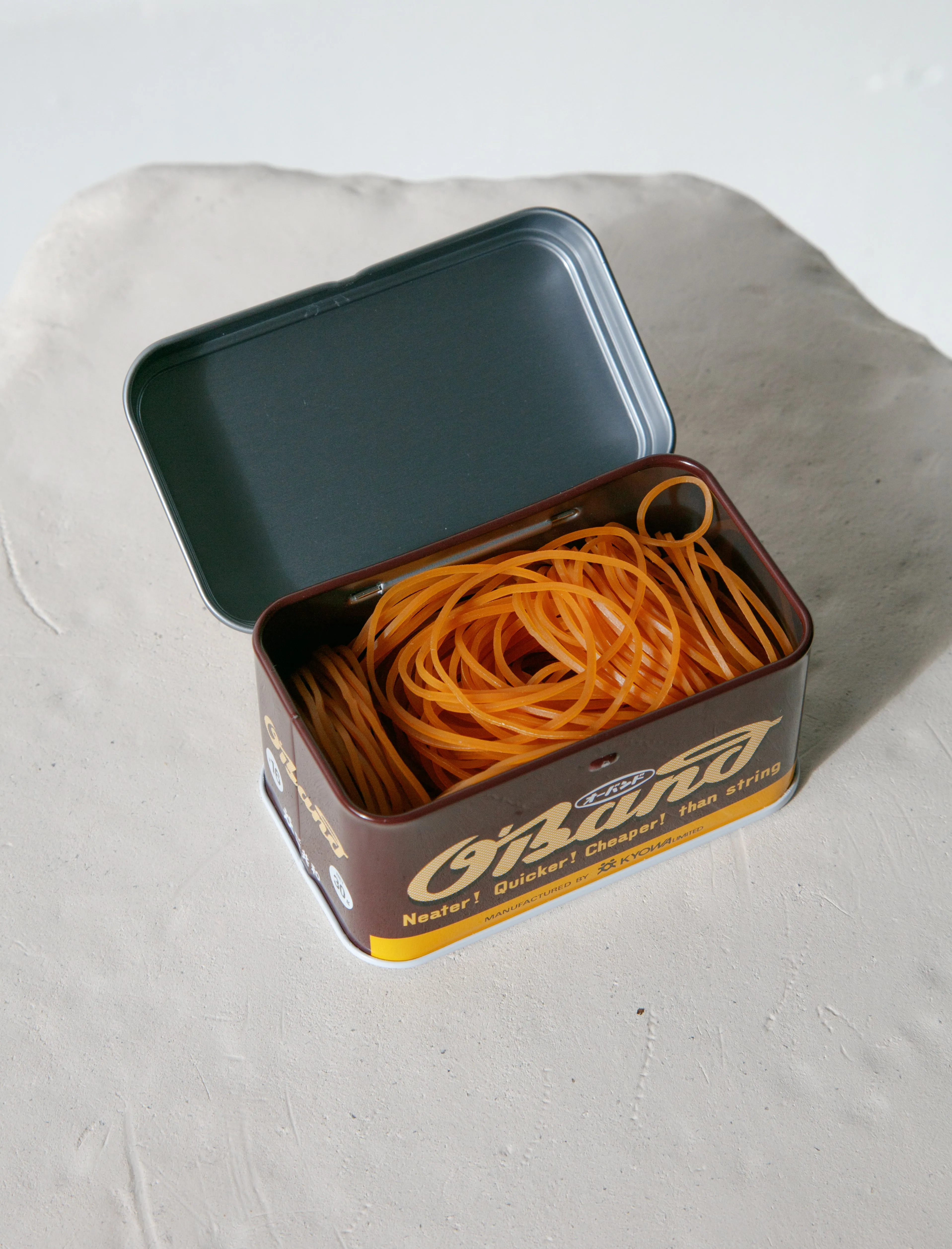Amber Rubber Band Brown Tin